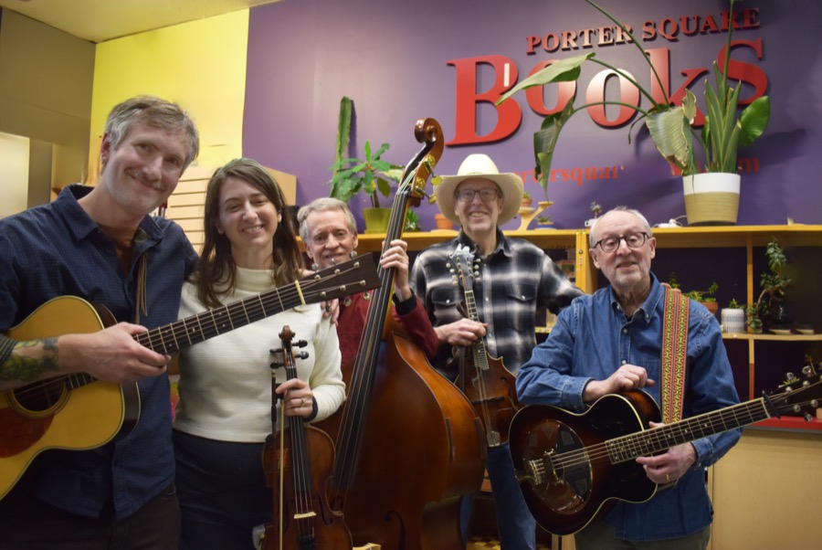 The full band at Porter Square Books